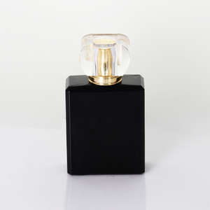 Elegante schwarz-goldene Parfümflasche aus Kölner Sprühglas
