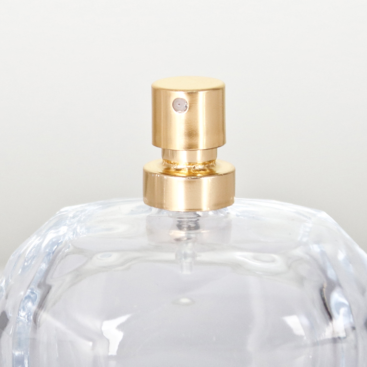 Neueste heiße Parfümflasche mit dickem, durchsichtigem Kunststoffdeckel und goldenem Nebelsprüher